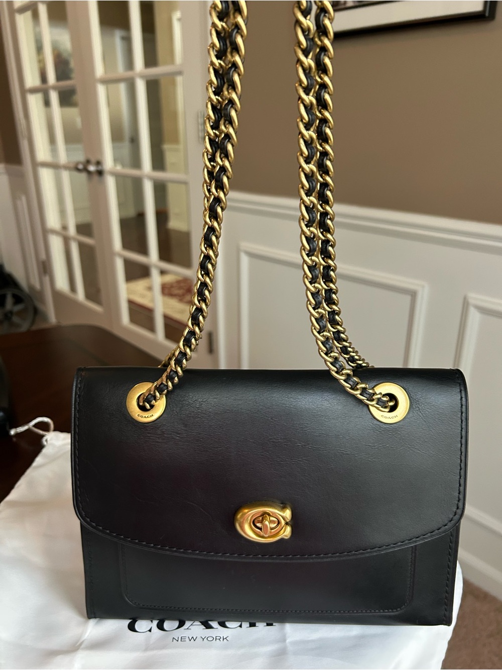 Coach Black Leather Shoulder Bag with Gold-Tone Chain and Turnlock